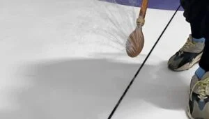 Curling ice preparations